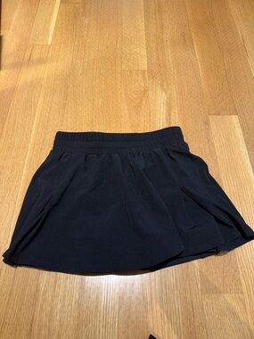 Year of Ours black tennis athletic pickleball skirt court skort